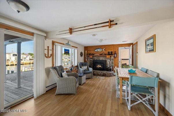 Dining room, Fireplace, Interior, Living room, Water, Wood Texture Flooring