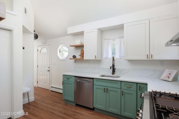 Interior, Kitchen, Marble Walls, Stainless Steel Appliances, Wood Texture Flooring