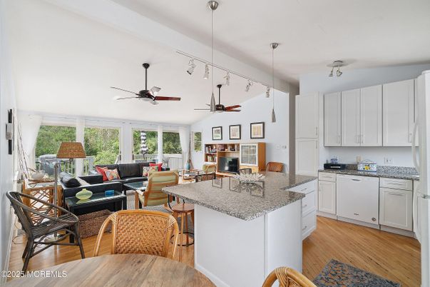 Dining room, Fireplace, Interior, Kitchen, Living room, Pendant Lights, Wood Texture Flooring