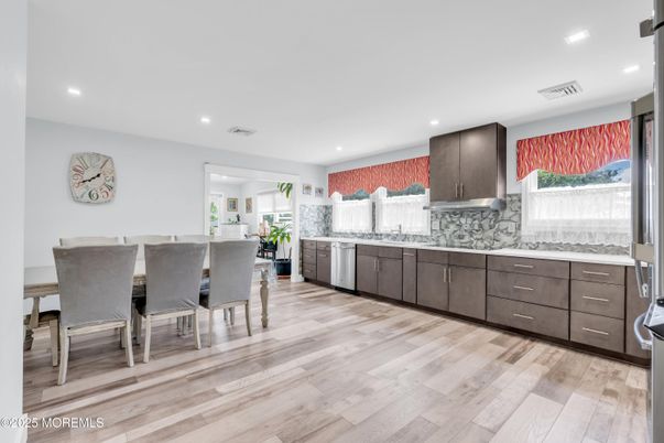Dining room, Interior, Kitchen, Recessed Lighting, Stainless Steel Appliances, Wood Texture Flooring