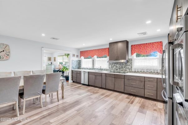 Dining room, Interior, Kitchen, Recessed Lighting, Stainless Steel Appliances, Wood Texture Flooring