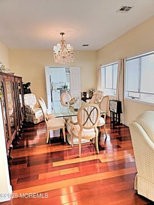 Chandelier, Dining room, Interior, Wood Texture Flooring