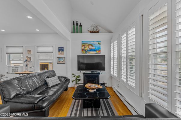Fireplace, Interior, Living room, Recessed Lighting, Wood Texture Flooring