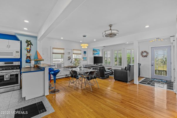 Chandelier, Dining room, Interior, Kitchen, Living room, Recessed Lighting, Wood Texture Flooring