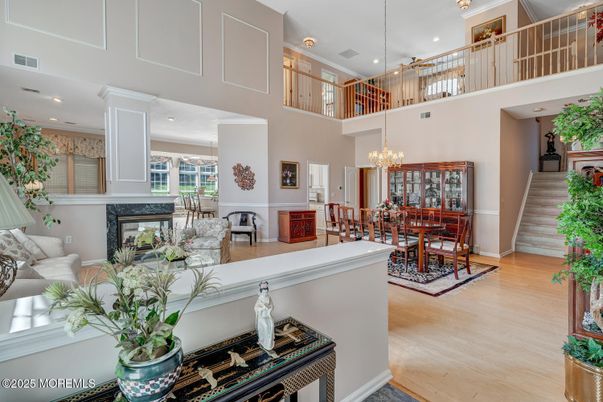 Chandelier, Dining room, Fireplace, Interior, Recessed Lighting, Wood Texture Flooring