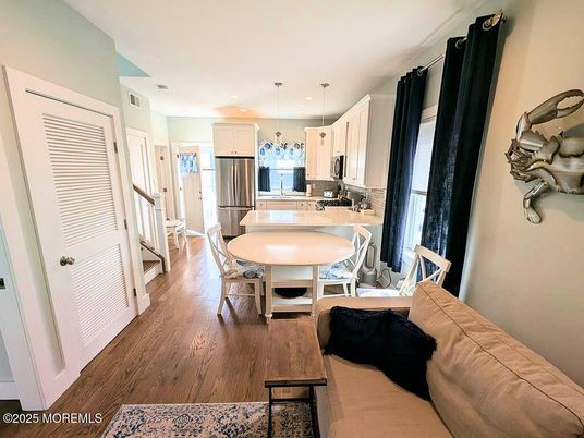 Dining room, Interior, Kitchen, Living room, Pendant Lights, Recessed Lighting, Stainless Steel Appliances, Wood Texture Flooring