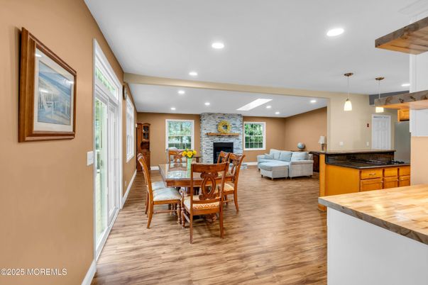Dining room, Fireplace, Interior, Kitchen, Living room, Pendant Lights, Recessed Lighting, Stone Walls, Wood Texture Flooring