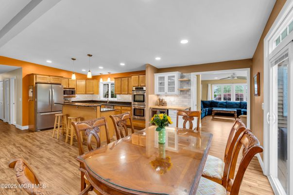 Dining room, Interior, Kitchen, Pendant Lights, Recessed Lighting, Stainless Steel Appliances, Wood Texture Flooring