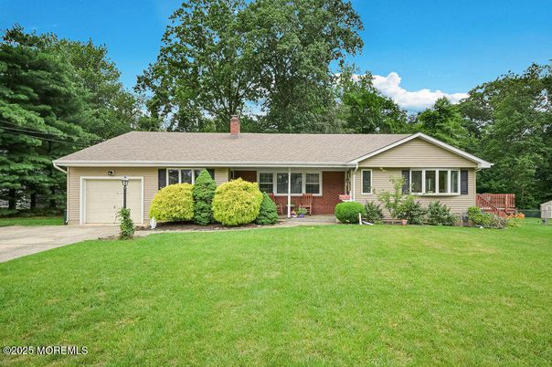 Attached, Backyard, Exterior, Facade, Brick Facade, Ranch