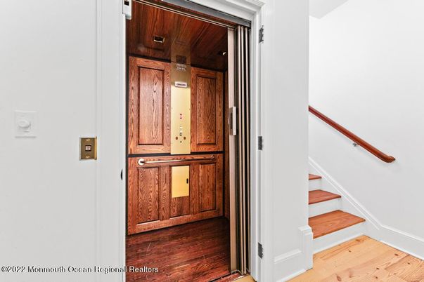 Elevator, Interior, Recessed Lighting, Wooden Ceilings, Wood Texture Flooring, Wooden Walls