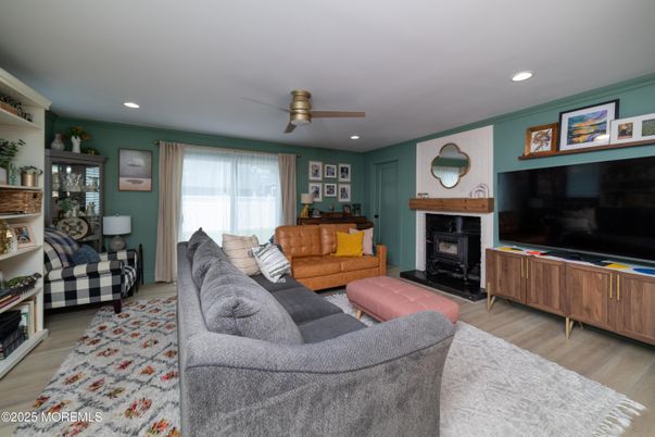 Fireplace, Interior, Living room, Recessed Lighting, Wood Texture Flooring