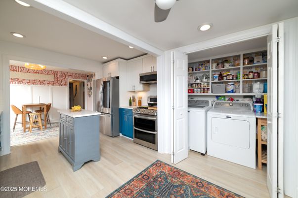 Interior, Kitchen, Recessed Lighting, Stainless Steel Appliances, Utility Closets, Washer, Wood Texture Flooring