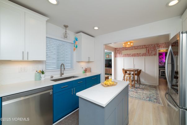 Dining room, Interior, Kitchen, Recessed Lighting, Stainless Steel Appliances, Wood Texture Flooring
