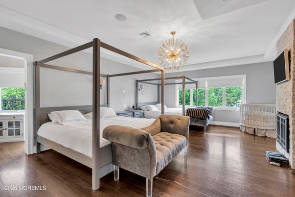 Bedroom, Chandelier, Fireplace, Interior, Pendant Lights, Wood Texture Flooring