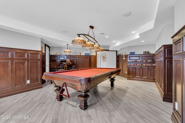 Billiard Table, Chandelier, Game Room, Interior, Pendant Lights, Recessed Lighting, Wood Texture Flooring