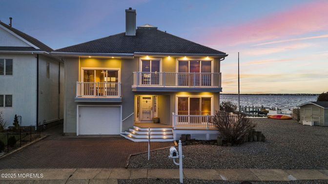 Exterior, Facade, Water, Raised Ranch