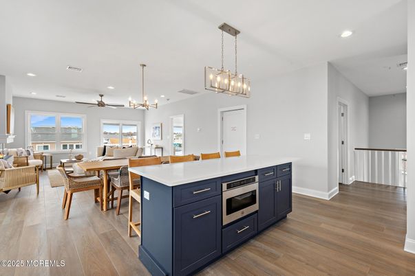 Dining room, Interior, Kitchen, Living room, Pendant Lights, Recessed Lighting, Wood Texture Flooring