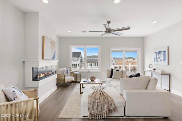 Fireplace, Interior, Living room, Recessed Lighting, Water, Wood Texture Flooring