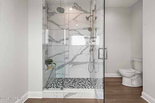Bathroom, Glass Shower, Interior, Marble Walls, Wood Texture Flooring
