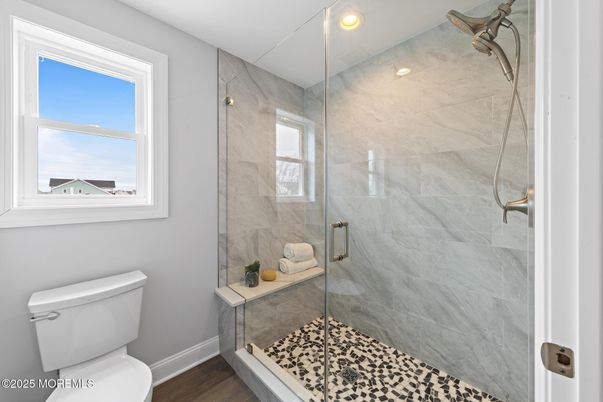 Bathroom, Glass Shower, Interior, Marble Walls, Recessed Lighting, Wood Texture Flooring