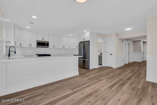 Interior, Kitchen, Recessed Lighting, Stainless Steel Appliances, Wood Texture Flooring