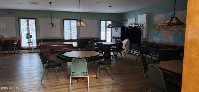 Dining room, Interior, Pendant Lights, Piano, Wood Texture Flooring