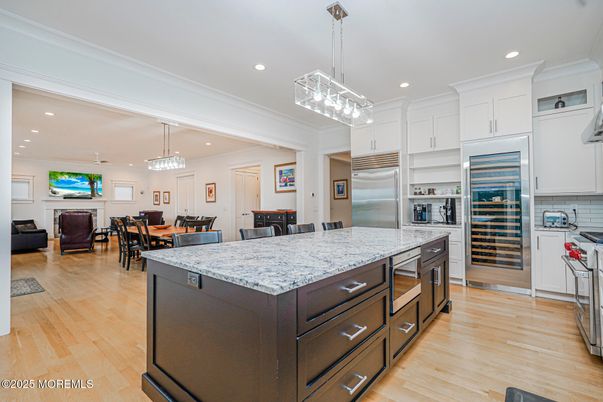 Dining room, Interior, Kitchen, Pendant Lights, Recessed Lighting, Stainless Steel Appliances, Wood Texture Flooring