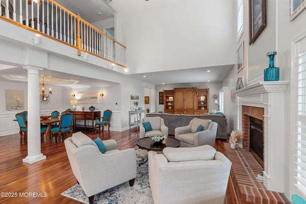 Chandelier, Dining room, Fireplace, Interior, Living room, Recessed Lighting, Wood Texture Flooring