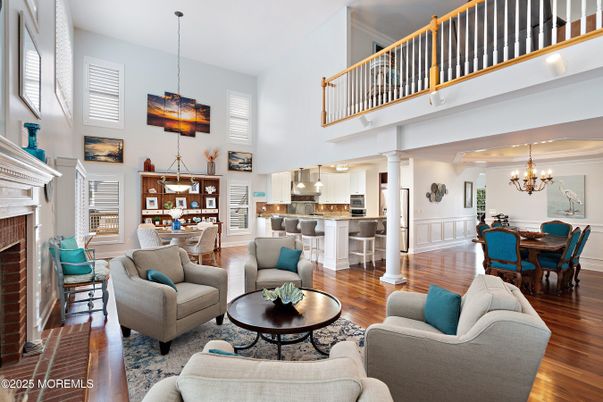 Chandelier, Dining room, Fireplace, Interior, Kitchen, Living room, Pendant Lights, Wood Texture Flooring