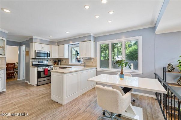 Interior, Kitchen, Recessed Lighting, Stainless Steel Appliances, Wood Texture Flooring