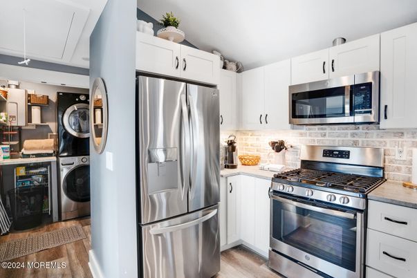 Interior, Kitchen, Stainless Steel Appliances, Washer, Wood Texture Flooring