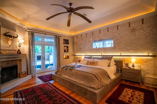 Bedroom, Fireplace, Interior, Stone Walls, Wood Texture Flooring