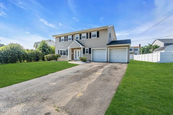 Attached, Backyard, Exterior, Facade, Split Level