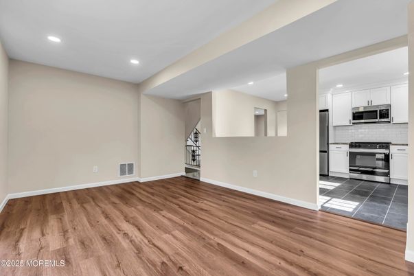 Interior, Kitchen, Recessed Lighting, Stainless Steel Appliances, Wood Texture Flooring