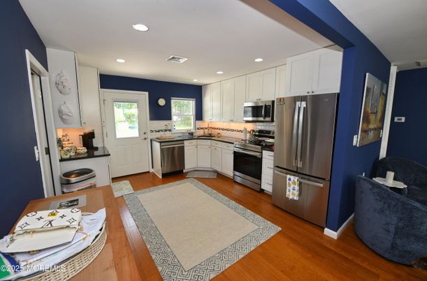 Interior, Kitchen, Recessed Lighting, Stainless Steel Appliances, Wood Texture Flooring