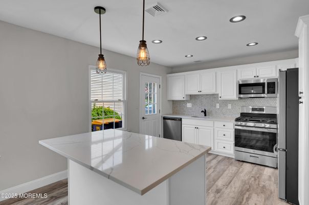 Interior, Kitchen, Pendant Lights, Recessed Lighting, Stainless Steel Appliances, Wood Texture Flooring