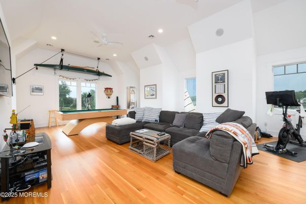 Billiard Table, Fitness Equipment, Game Room, Interior, Living room, Recessed Lighting, Wood Texture Flooring