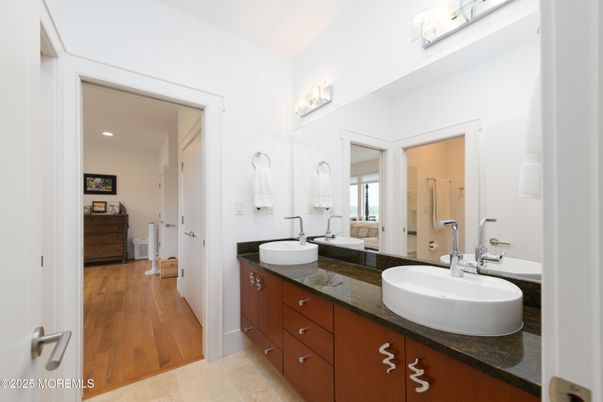 Bathroom, Dual Sink Vanities, Interior, Recessed Lighting, Wood Texture Flooring