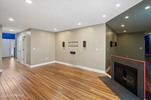 Empty room, Fireplace, Interior, Recessed Lighting, Wood Texture Flooring