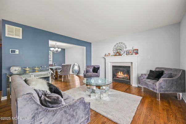 Chandelier, Dining room, Fireplace, Interior, Living room, Wood Texture Flooring