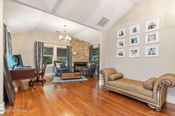 Chandelier, Fireplace, Home Office, Interior, Living room, Stone Walls, Wood Texture Flooring