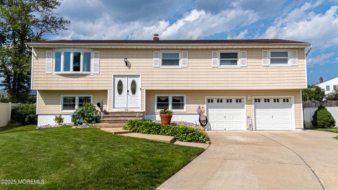 Attached, Exterior, Facade, Raised Ranch