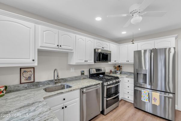 Interior, Kitchen, Recessed Lighting, Stainless Steel Appliances, Wood Texture Flooring