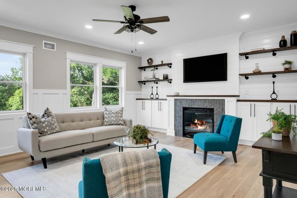 Fireplace, Interior, Living room, Recessed Lighting, Wood Texture Flooring