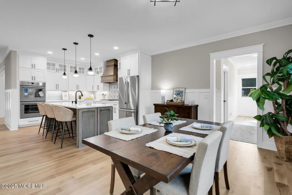 Dining room, Interior, Kitchen, Pendant Lights, Recessed Lighting, Stainless Steel Appliances, Wood Texture Flooring