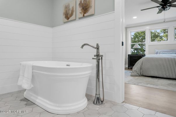 Bathroom, Free Standing Baths, Interior, Marble, Recessed Lighting, Wood Texture Flooring