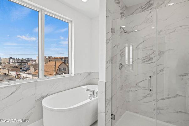 Bathroom, Free Standing Baths, Glass Shower, Interior, Marble Walls, Recessed Lighting