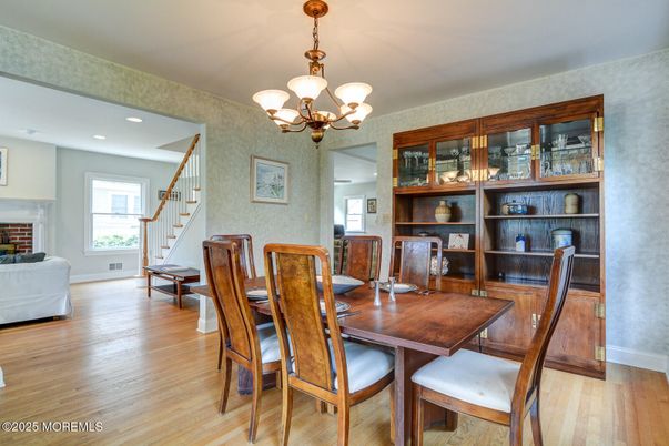 Chandelier, Dining room, Fireplace, Interior, Recessed Lighting, Wood Texture Flooring