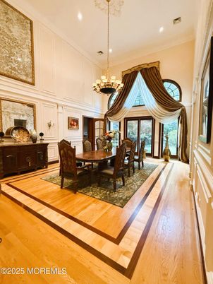 Chandelier, Dining room, Fireplace, Interior, Recessed Lighting, Wood Texture Flooring