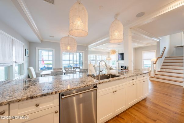 Chandelier, Interior, Kitchen, Pendant Lights, Recessed Lighting, Stainless Steel Appliances, Wood Texture Flooring